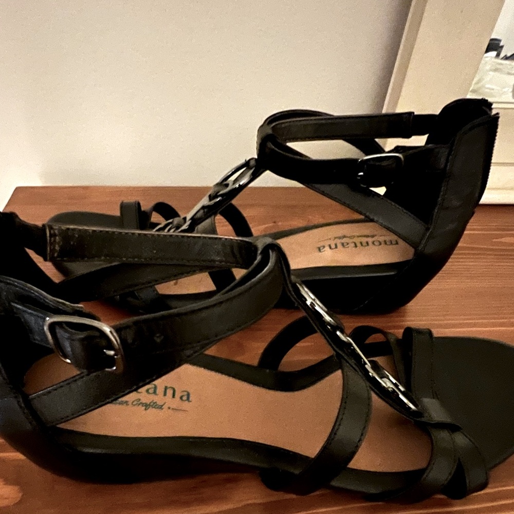 Black leather dress sandal. New like condition.  Barely worn, very comfortable